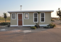 Building a million houses out of waste