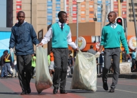 School learners clean the streets of Johannesburg