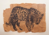 Leopard made of gin traps on display