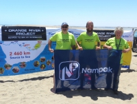 Human waste, litter & chemicals drown the Orange River